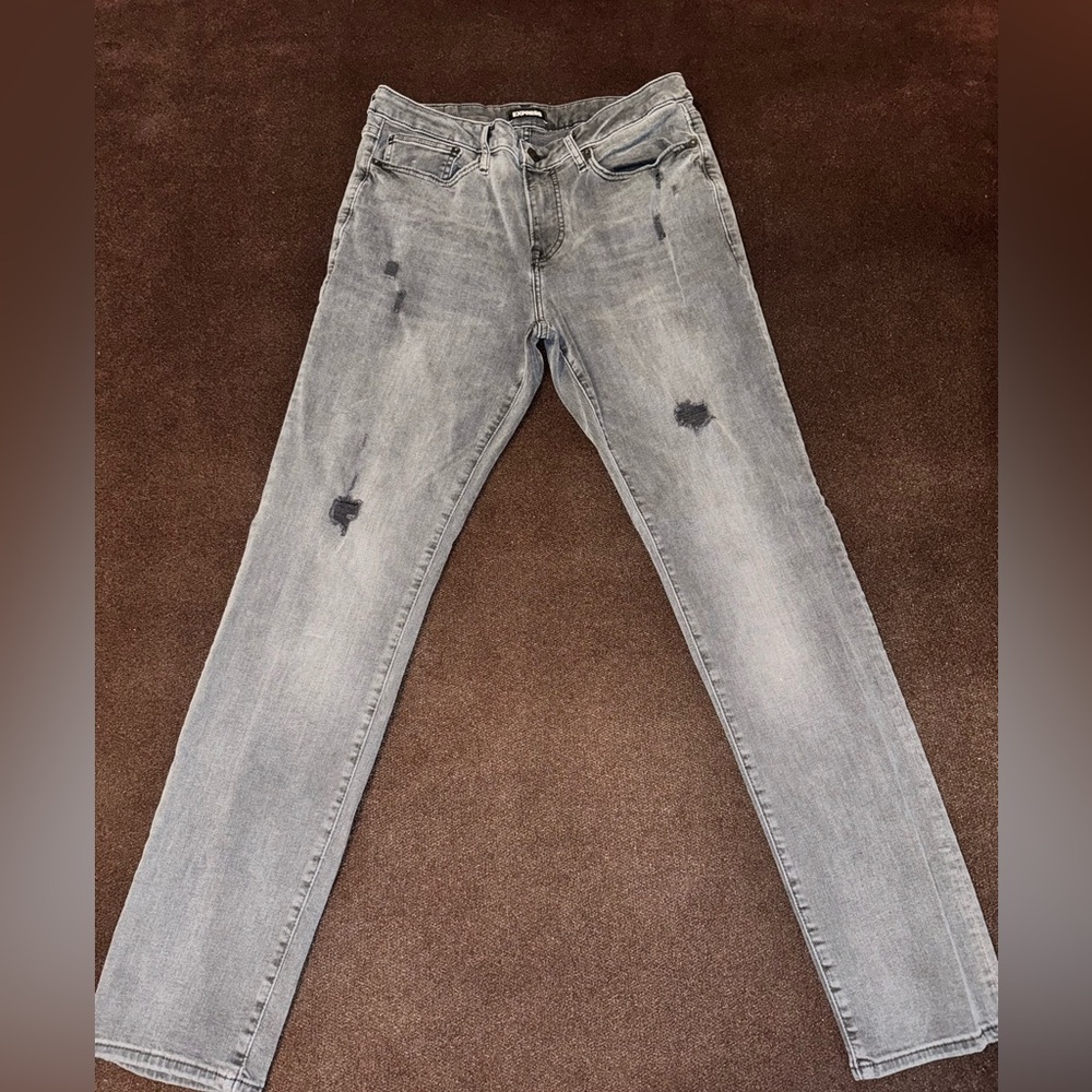 Black Slim-Fit Express Jeans.  Distressed patchwork on legs. Sz. 32x34.